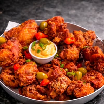 Frango à Passarinho